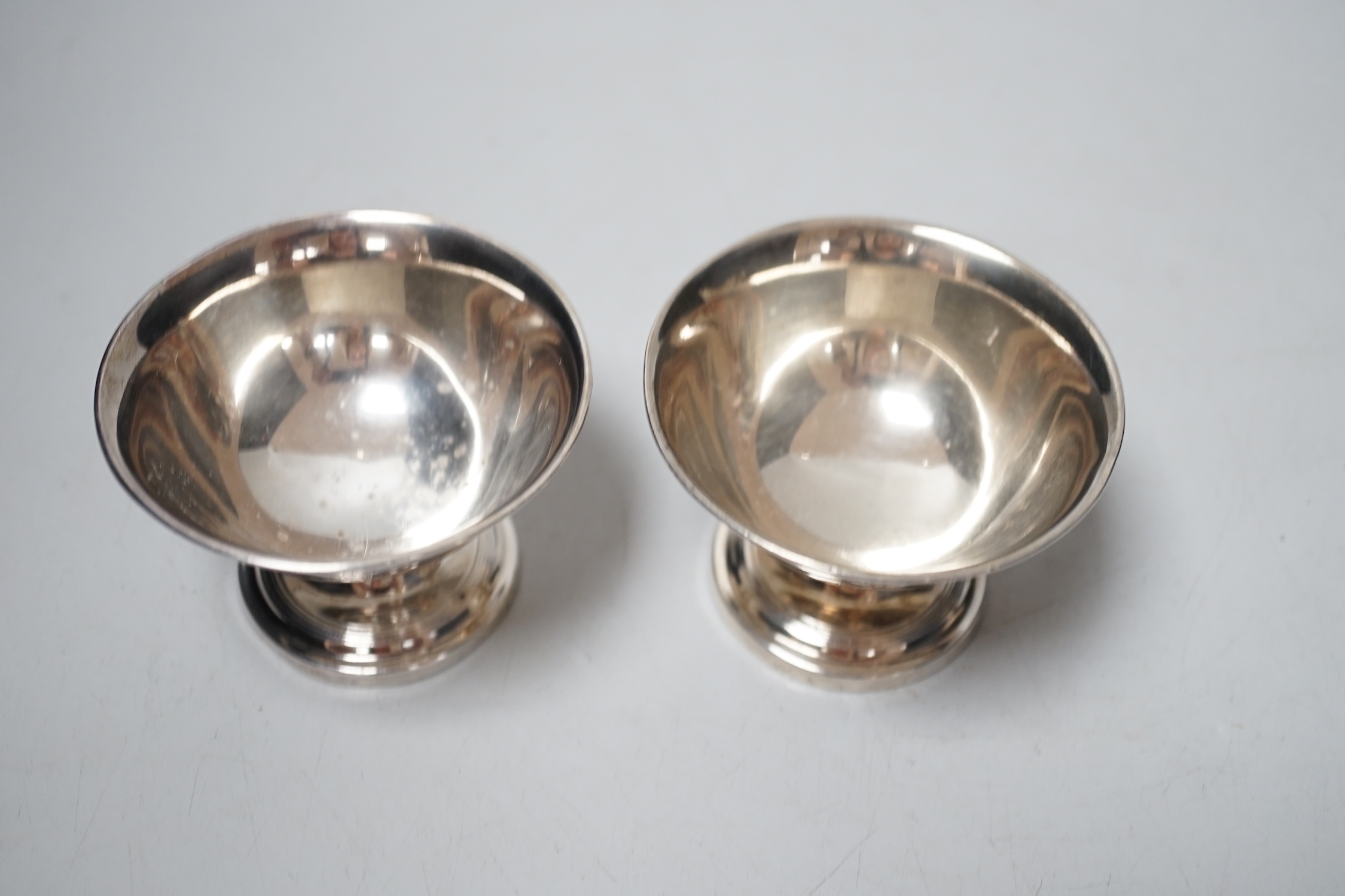 A pair of Matthew Boulton silver pedestal salt cellars, marks rubbed, height 5cm.